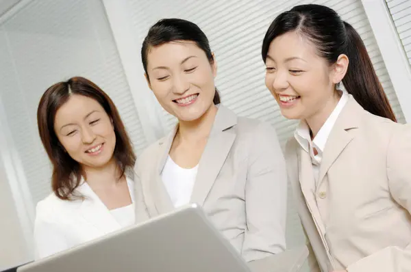 Three Young Business Women Working Together — Stock Photo, Image