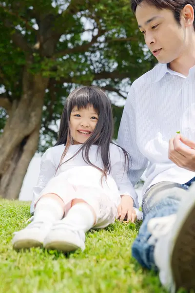 Young Asian Family Playing Outdoors Grass Stock Picture