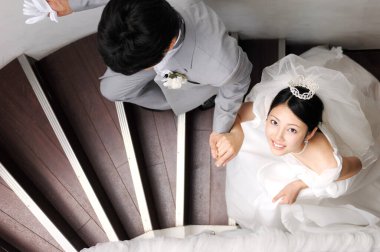 asian young couple in wedding dress