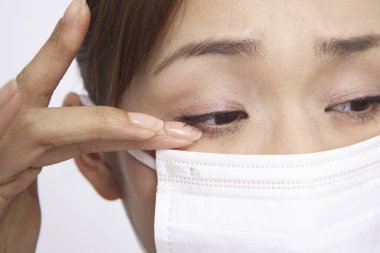 young asian girl wearing a  face mask