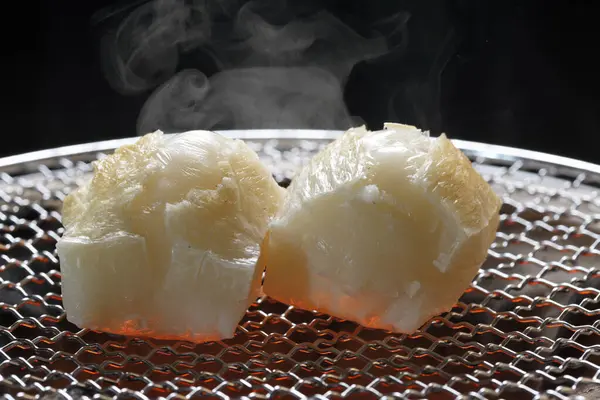 Stock image close up view of delicious Rice Cakes on grill