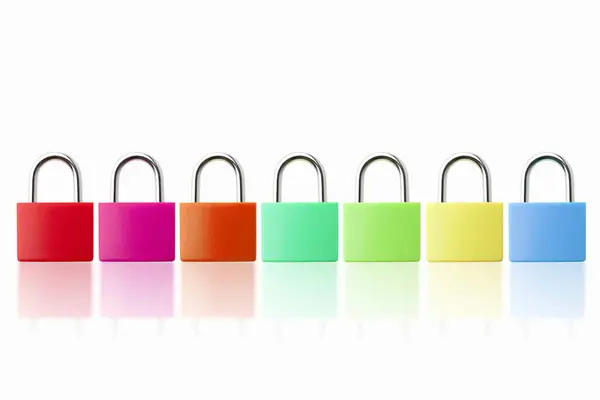 Close View Colorful Padlocks White Table Background — Stock Photo, Image