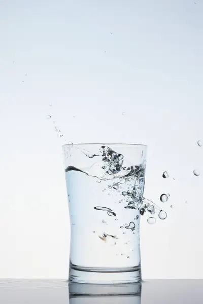 Transparent Water Splashing Gass Stock Image