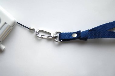close-up view of webbing lanyard on white background 