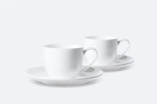 Две Белые Чашки Изолированы Белом Фоне — стоковое фото