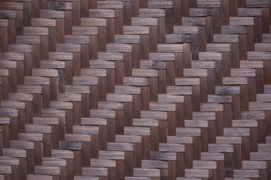 Tekrarlanan geometrik tahta bloklar soyut desenli desenler oluşturuyor