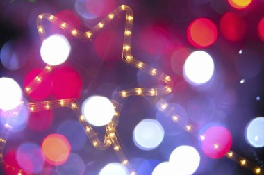 Soyut Noel arkaplanı. Parlak şenlikli bokeh ışıkları.         