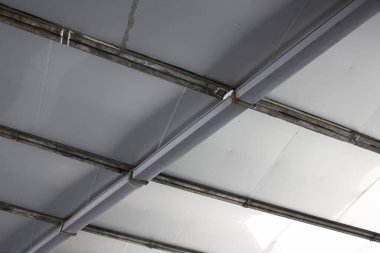 metal sheet for construction  of a factory on background, close up