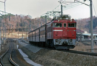 train moving on the railroad  on nature background in Japan