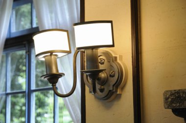 modern lamp on the wall on background