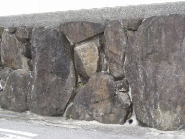 Gri taşlar ve granitten duvar, mimari arka plan