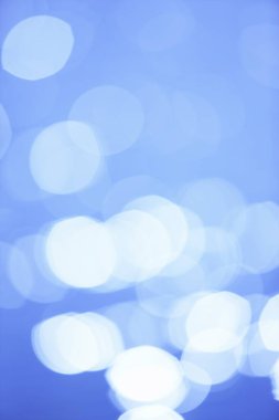 Mavi arka plan soyut Bokeh ışıkları