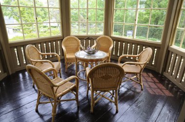 chairs,table in an old house on background