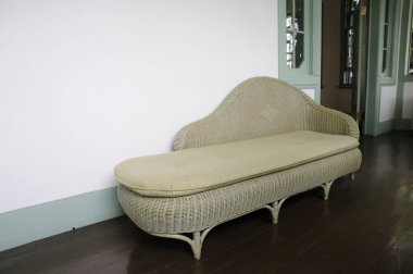 old sofa at room on background, close up