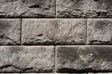 Bir sürü taşı olan eski bir binanın duvarının dokusu..