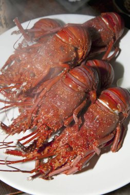 boiled crayfish with spices on plate