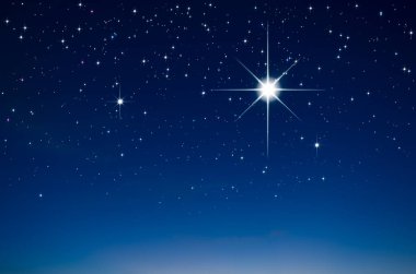 Mavi gökyüzü arkaplanlı noel yıldızı