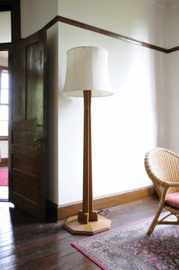 interior view of  modern apartment with chair and lamp