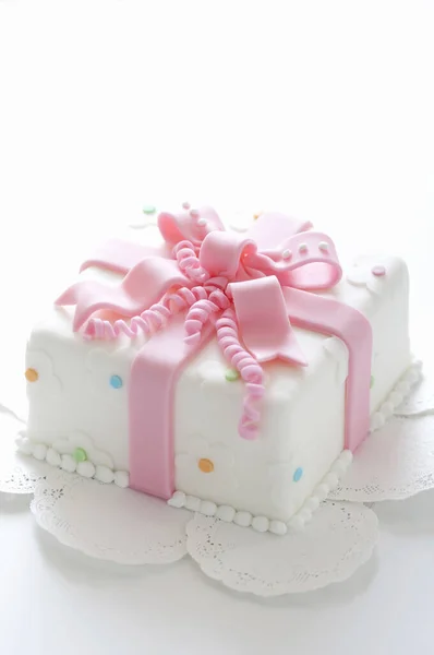 sweet pink cake in gift shape