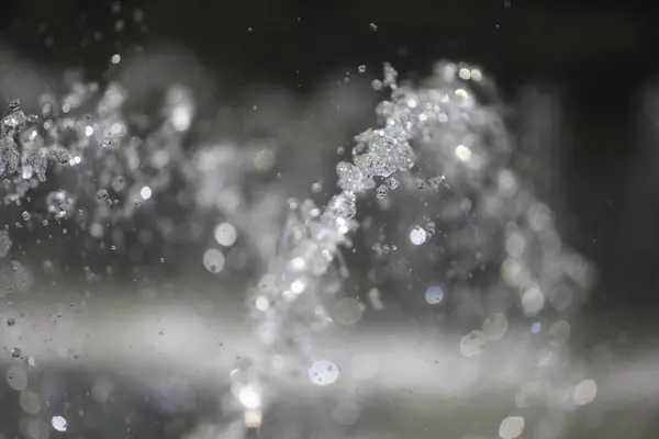 stock image close up of water splashes in fountain on summer day