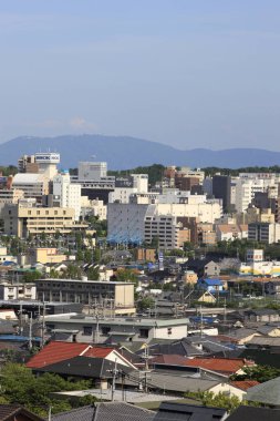 Japonya 'daki modern şehir manzarası, arka planda seyahat yeri