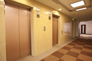 interior of modern office corridor with doors 