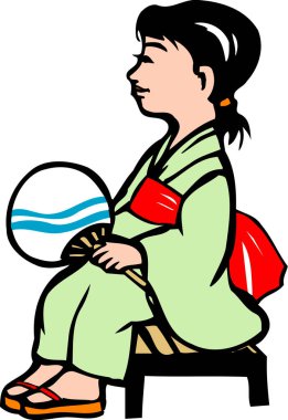 Yelpazeli bir kimono giyen kız.