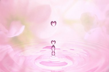 Kalp damlası olan soyut pembe arkaplan 
