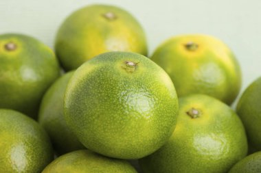 Yeşil mandalina. meyve arka planı. görünümü kapat