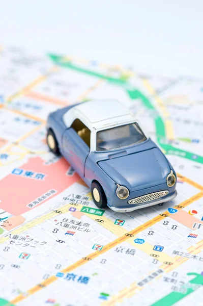 toy car on paper map