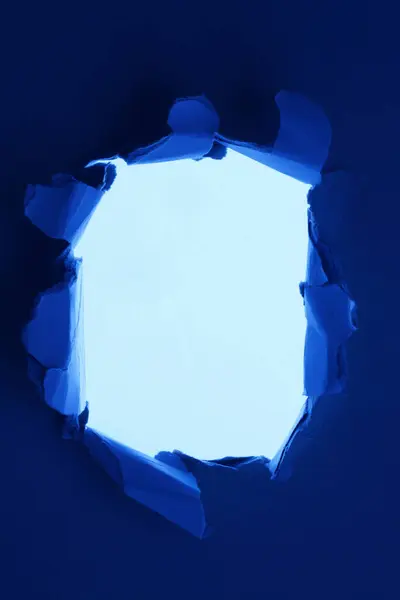 Hole Torn Paper Blue Background — Stock Photo, Image