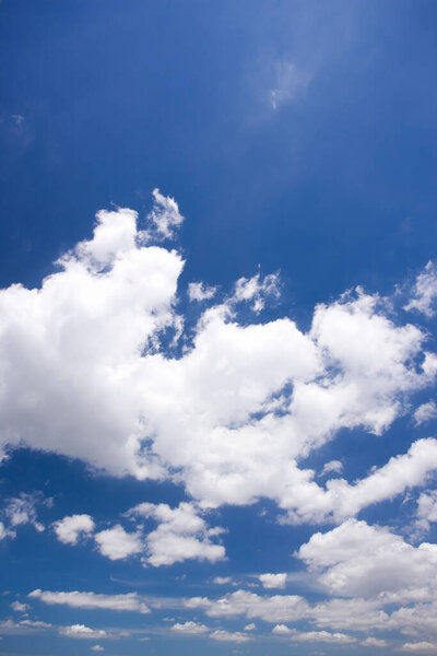 white clouds in the blue sky, abstract nature background.