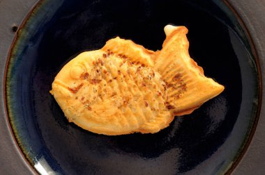 Lezzetli Japon yemekleri, Taki yaki, balık şeklinde tatlı. 