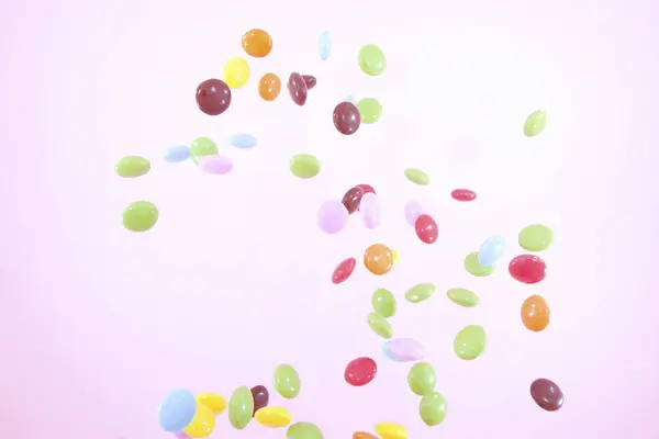 Farbige Bonbons Auf Rosa Hintergrund Ansicht Von Oben — Stockfoto
