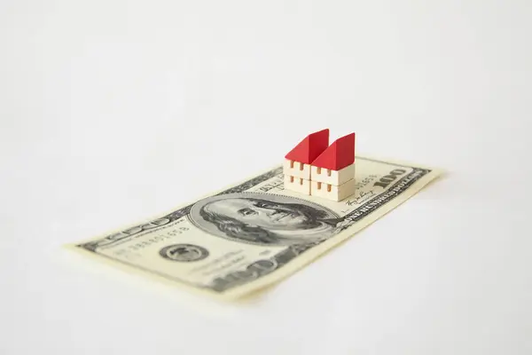Casas Pequenas Uma Nota Dólar Fundo Close — Fotografia de Stock