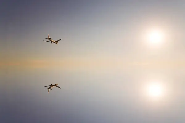 airplane flying over sea on nature background