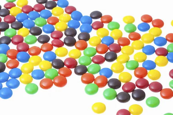 Schokoladenbonbons Regenbogenfarben — Stockfoto