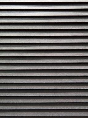 siyah kıvrımlı metal doku arkaplanı.