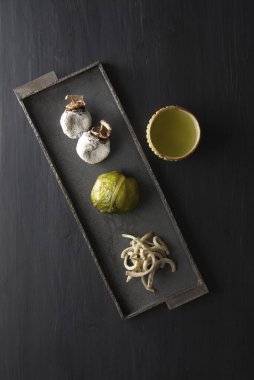 Arranging traditional japanese food items