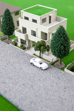 miniature houses models and green trees. real estate concept    