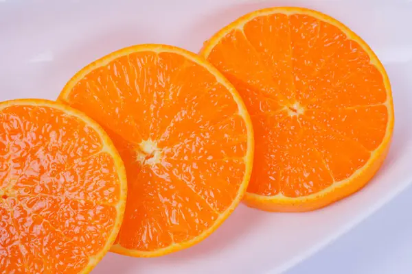 Plate Sliced Oranges Isolated White Background — Stock Photo, Image