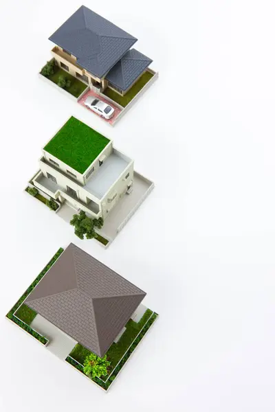 Pequenos Modelos Casas Fundo Branco Conceito Hipoteca — Fotografia de Stock