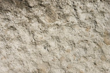 Taş duvar dokusunun soyut arkaplanı.