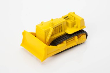 yellow toy truck on a white background