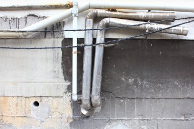 Arka planda metal endüstriyel borular, kapatın.