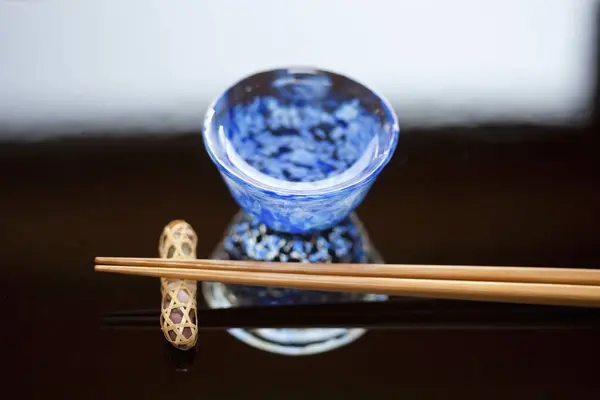 Close View Chopsticks Placed Resting Base Cup Sake — Stock Photo, Image