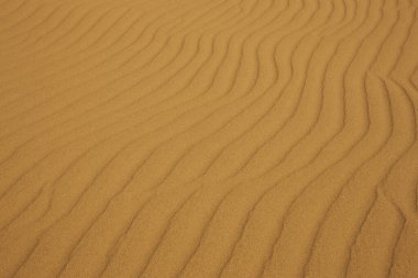 Kum dokusuna yakından bak. Kum tepeciği. Soyut kum dokusu