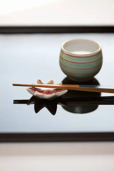 Close View Chopsticks Placed Resting Base Cup Sake — Stock Photo, Image