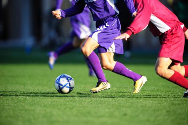 Japonya 'da futbol oynayan erkeklerin kırpılmış bölümü