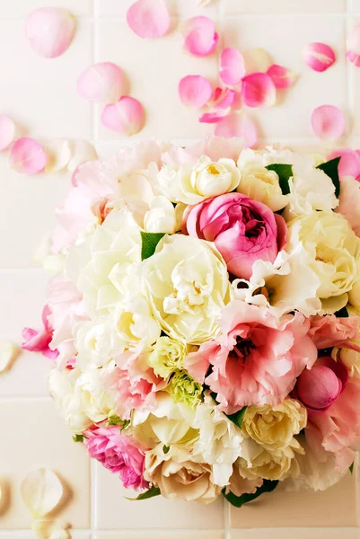 bouquet with pink and white peonies, pink roses and peonies.
